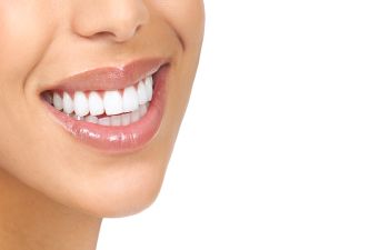 Patient Smiling After Porcelain Veneers from Kennesaw Mountain Dental Associates