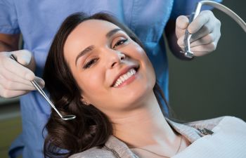 Woman Smiling in Dentist Chair Kennesaw GA