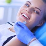 woman happy in the dentist chair
